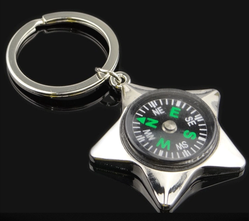 Llavero Metalico en forma de Estrella con Brujula, 4.1 x 4.5 cmts