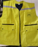 Chaleco Toluca, en drill con forro interno, franjas reflectivas