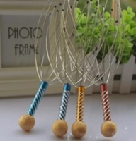 Masajeador de Cabeza, en alambre, de 11 x 16 cmts