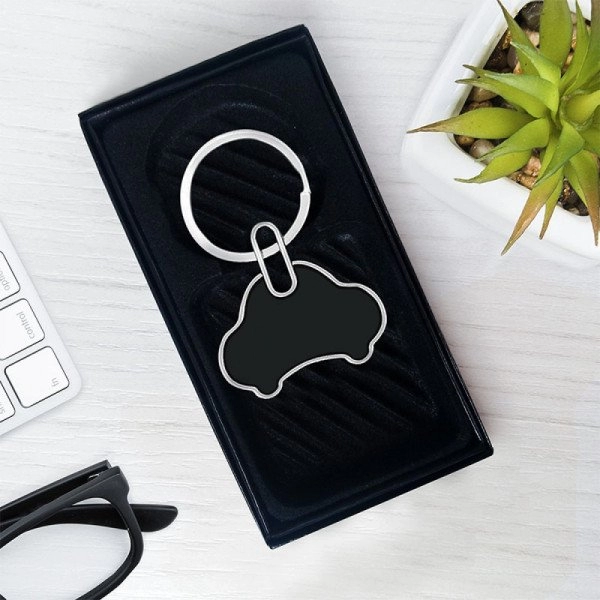 Llavero Limo, metalico en forma de carro, de 3.8 x 2.7 cmts.