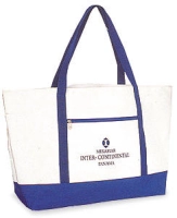 Bolso Florencia, en lona, 41 x 34 x 14 cmts, con zipper y bolsillo frontal